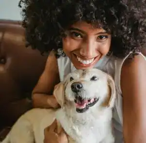 happy pet parent with dog 300x294 1 1